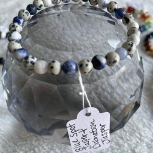 Blue Spot Jasper is a stone that has healing properties. It is known to: Bring calmness Promote courage • Stabilize the aura • Build inner strength • Balance yin yang energy • Dalmatian Jasper is a spotted stone that has healing properties related to the digestive system, the nervous system, the muscles, tendons, and cartilage, and the balance of energies. It is said to make the gut more reactive, limit stomach pain and other issues, heal sprains and gallstones, and relieve pain and arthritis. It is also believed to reconnect us with our playful nature and align the physical, emotional, and mental bodies with the etheric realm.