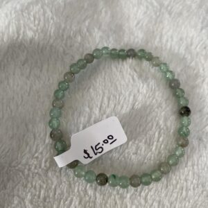This green gemstone bracelet will assist in healing your body's HEART Chakra energy center, which governs your heart, thymus gland, lymph, immune system, lungs, bronchia, secondary circulatory system, arms, and hands. The green centre connects us to unconditional love, compassion, and kindness; and balances our overall energy.