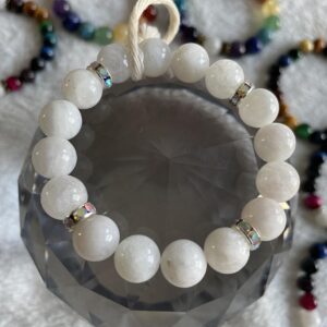 Moonstone healing properties include: • Promoting emotional healing by calming and balancing emotions, enhancing intuition, and bringing inner growth and strength. • Aiding the digestive system, assimilating nutrients, eliminating toxins and fluid retention, and alleviating degenerative conditions of skin, hair, eyes, and organs. • Stimulating the pineal gland and balancing hormonal cycles, being excellent for PMS, conception, pregnancy, childbirth, and breast-feeding. • Relieving pregnancy-related ailments and healing reproductive problems and infertility. • Symbolizing fertility, sensuality, intuition, emotional balance and good fortune.