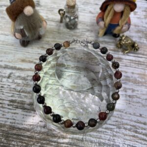 This Brown & RED Natural Stone 4mm with Silver Accents Clasp Bracelet will add natural healing and beauty to your life!