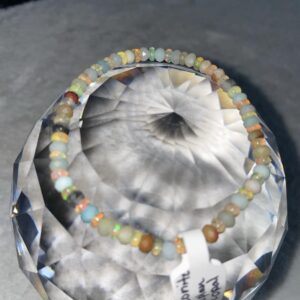 The properties in this amazonite and fire opal bracelet are known for balancing moods, improving sleep patterns, relieving stress, and treating depression or anxiety by stimulating the mind so that it releases serotonin~ a feel good hormone.