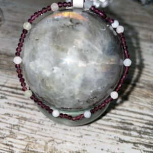 This dainty faceted garnet and morganite bracelet will provide a sparkly appearance to your bracelet combination while assisting your body to heal the organs within the Root chakra energy center.
