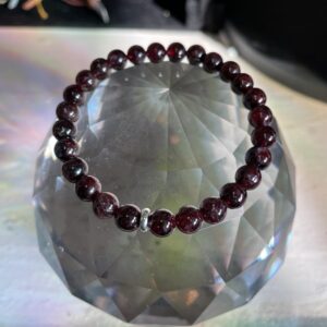 The energies within this red garnet bracelet are noted to enhance sexual energy, flush out toxins, improve circulation, foster self-confidence, and nurture relationships along with promoting a positive outlook.