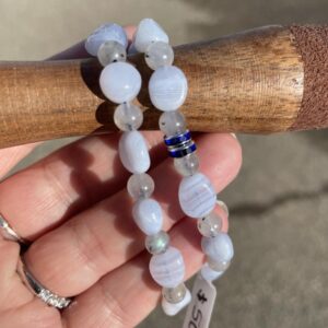 This Blue Lace Agate & Labradorite Bracelet has healing properties that neutralize anger, infection, inflammation, and fever. These properties are also known to strengthen and accelerate the repair of bones, thyroid deficiencies, throat and lymph infections.