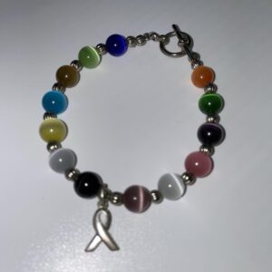 The healing properties within this Cat’s Eye bracelet is believed to protect the wearer from evil spirits, treat eye disorders and improve night vision, relieve headaches and sciatic pain, aid the nervous system and associated pains. The properties of Cat's Eye are also known to heal the kidneys, pancreas, liver, lymph nodes, spleen, and issues associated with leukemia.