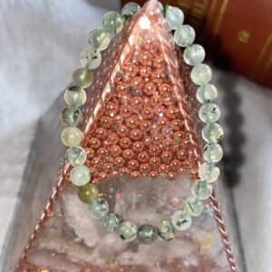 This prehnite bracelet will assist stimulating your metabolism, cleansing toxins from the body, and improving your immune system. Its properties are also known for helping clear the mind of painful emotions or memories and bringing you more patience, empathy and compassion.