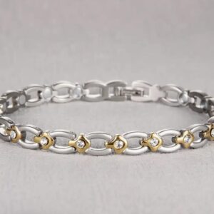 This gorgeously stunning silver and gold magnetic bracelet is lined with 3500 Gaus magnets that are known to assist the body to reduce inflammation and pain.