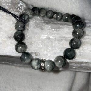 This Silvery Eagle Eye Bracelet has the healing properties to assist the body to heal. It is known to relieve bodily symptoms including lassitude and headaches, lessen emotional and mental stress, bring mental and physical stability and promote equilibrium and harmony.