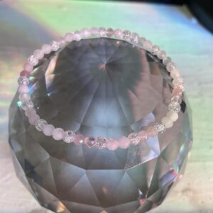 This delicate but powerful rose quartz bracelet will assist you in attracting unconditional love within your inner self as well as outward in relationships.