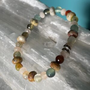 This Rainbow Agate Quartz Bracelet will assist the whole body to heal itself. All the colors of the rainbow have their specific healing properties; thus, this bracelet touches on all of the body's energy centers.
