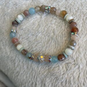 This Glitzed Cotton Candy at Sea 6mm Energy Bracelet will assist the body to heal itself; emotionally, physically, mentally, and spiritually.
