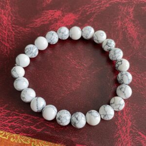 This Howlite 8mm Bracelet has the healing properties that are known to balance energy, restore strength, providing comfort during stress, promote emotional healing and spiritual growth, alone with reduce stress and negative emotions.