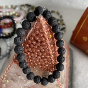 This LAVA stone 8mm Energy Bracelet is known to ground the root chakra, provide courage when facing difficult situations, and detox negative energy from the body.