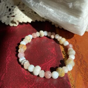This Powerful Pink Bliss 8mm Energy Bracelet will assist your body to heal its sacral, solar plexus, and root chakra energy centers.