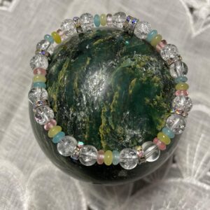 This Crystaline Pastels 6mm Energy Bracelet is a stunning accent to your appearance that has the healing properties to assist healing both the solar plexus and throat chakra energy centers.