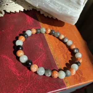 This ORANGE Marigold Sunstone & Labradorite & Obsidian 6mm Energy Bracelet will assist your body in treating chronic sore throats, reducing stomach tension and relieving ulcers.  It treats cartilage and spinal problems.