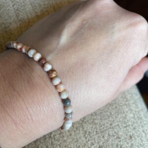 This RED Map Jasper 4mm Energy Bracelet has the healing properties known to promote physical strength, stamina, and endurance, boost energy levels, stimulate the root chakra, which governs feelings of safety and security.