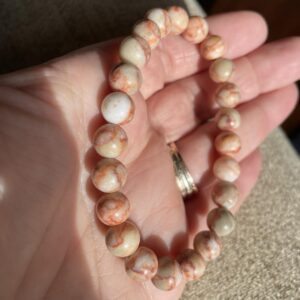 This RED Map Jasper 8mm Energy Bracelet has the healing properties known to promote physical strength, stamina, and endurance, boost energy levels, stimulate the root chakra, which governs feelings of safety and security.