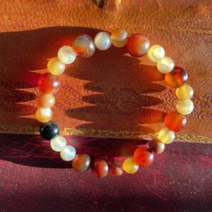 This Multi-Amber & Agate 8mm Energy Bracelet will assist your body to heal all that is within the Root, Sacral, and Solar Plexus Chakra energy centers.