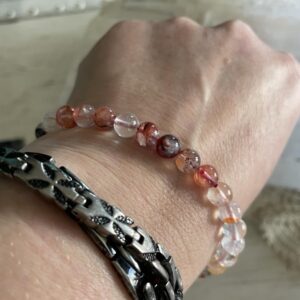 This RED Rutilated Quartz 6mm Energy Bracelet will assist your body's innate ability to enhance spiritual growth, promote clarity of mind, amplify energy, release negative energy and blockages in one's life, and provide physical protection.