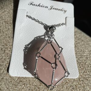 This Rose Quartz Tear Drop Cage Necklace contains the healing properties known to assist the body in healing a multitude of health needs.