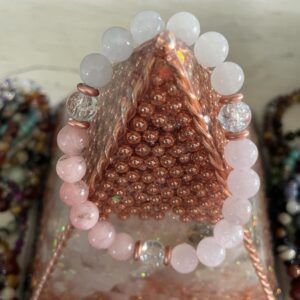 This Rose & Crackle Quartz & Pink Opal 8mm Energy Bracelet has healing properties that will assist physical, emotional, and even spiritual benefits.