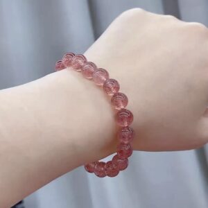 This Strawberry Quartz Energy Bracelet has the healing properties to assist the body's innate ability to alleviate aches and pains.  It may also strengthen the heart & circulatory system.  It is known to boost the immune system and detox the blood.  On an emotional level, it may assist in releasing emotional blockages and resolving past traumas.